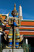 Bangkok Grand Palace, pair of giant yakshas statues the gatekeepers of the entrance of the eastern gallery. Temple of the Emerald Buddha (Wat Phra Kaew). 